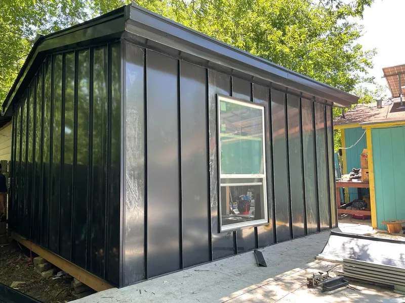 Black standing seam metal wall panels for Roof Inspection in Napa